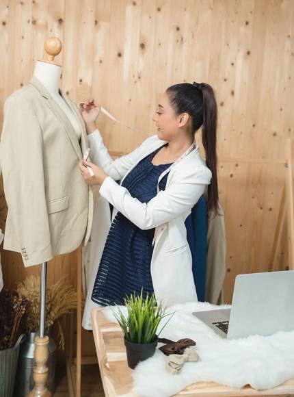 woman-business-owner-working-her-tailor-shop